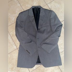 Men’s Van Huesen suits. 2 suits sold separately.